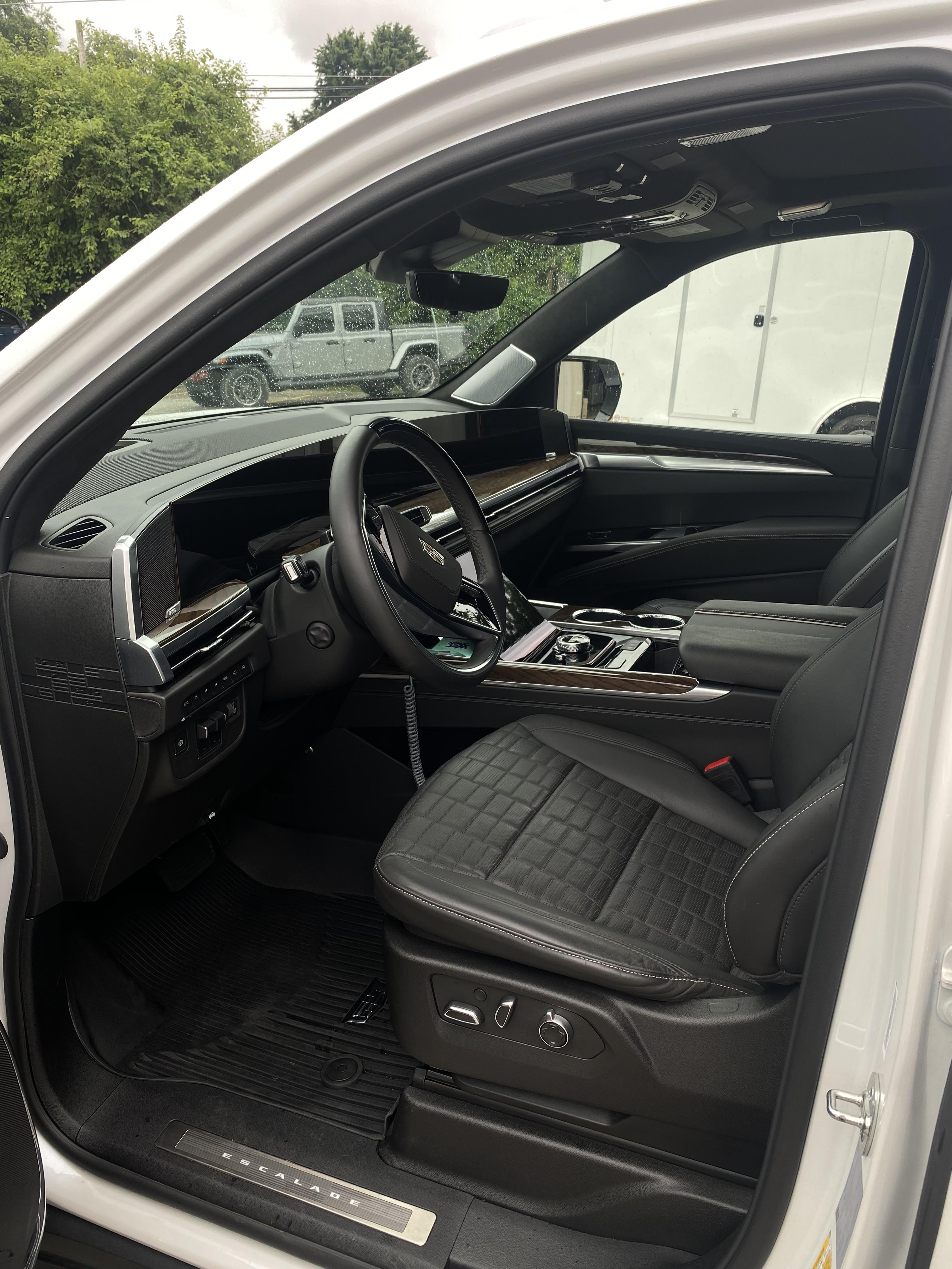 Cadillac Escalade front seat and steering wheel, freshly detailed