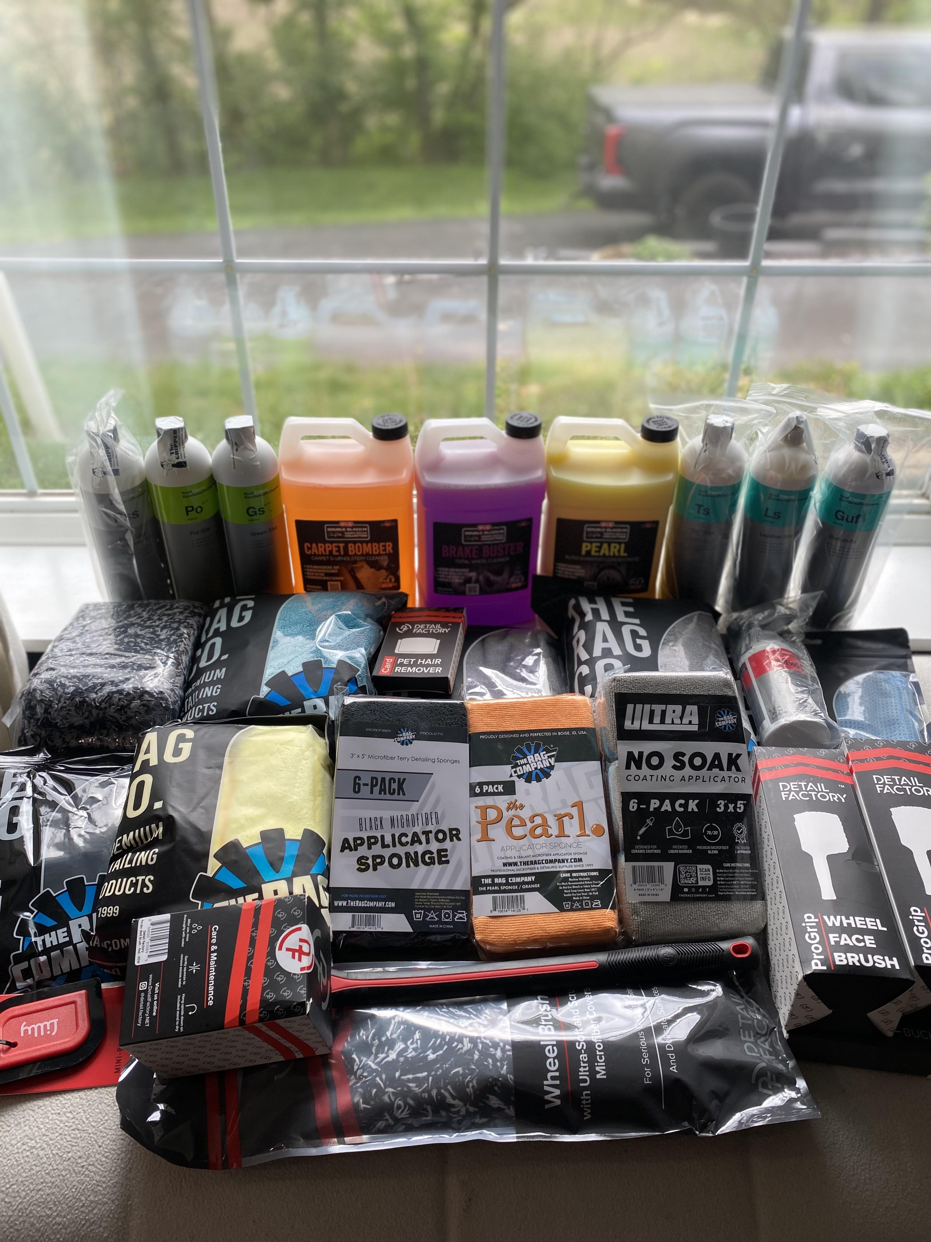 Professional-grade detailing chemicals and supplies used by Kurtz Details